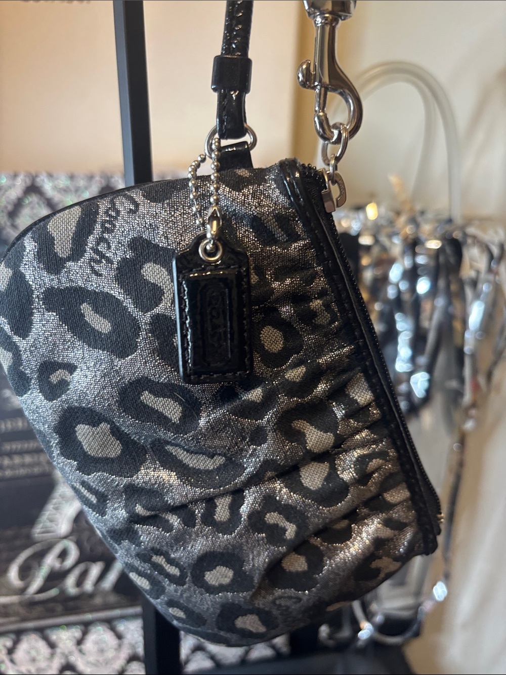 Coach Metallic Silver and Black Leopard Print Wristlet Pouch